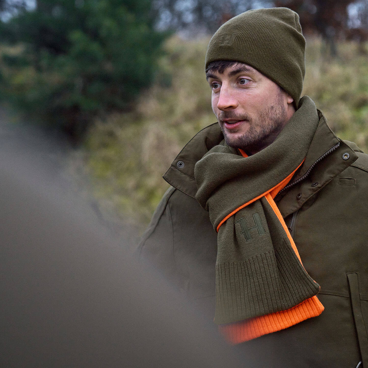Härkila roll collar reversible (willow green/orange)